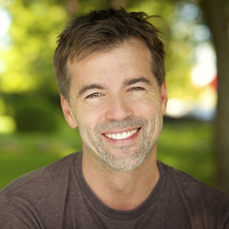 Mature man smiling with the benefit of CEREC same-day dentistry